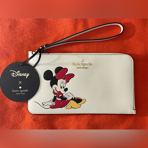 kate spade Handbags - Kate Spade Disney X  Minnie Medium Ziip Wristlet. NWT  Disney Fans!!!